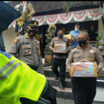 Polres Gianyar Peduli Warga Terdampak Covid-19. Bagikan Paket Sembako Di Masa PPKM Darurat.