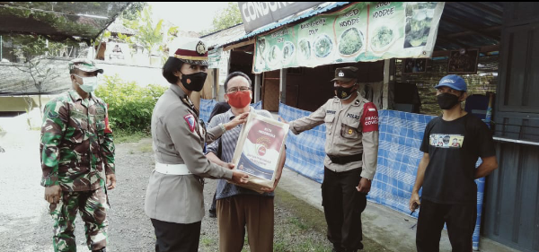 Polres Gianyar Peduli Masyarakat Terdampak.