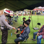 Polres Gianyar Bagikan Masker,Wujud Kepedulian Polri Agar Masyarakat Patuhi Prokes